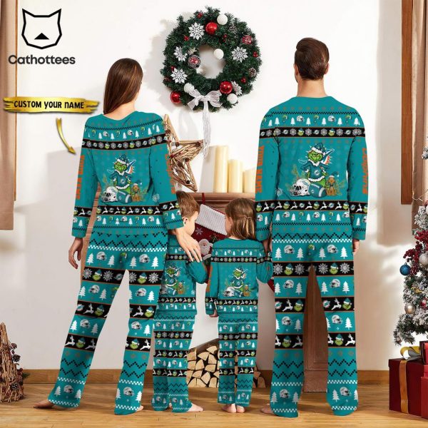 Personalized Miami Dolphins Pajamas Grinch Christmas And Sport Team Emerald Green Mascot Design Pajamas Set Family