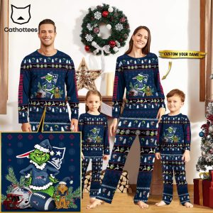 Personalized New England Patriots Pajamas Grinch Christmas And Sport Team Blue Mascot Design Pajamas Set Family